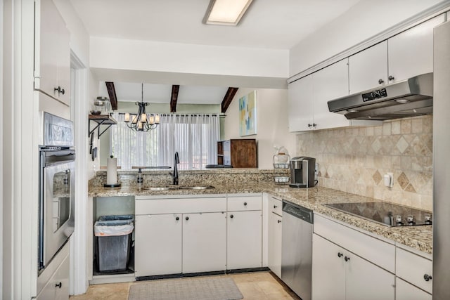 kitchen featuring stainless steel appliances, light tile flooring, backsplash, sink, and white cabinetry