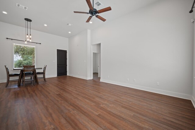 living room featuring high vaulted ceiling, ceiling fan, baseboards, dark wood finished floors, and recessed lighting