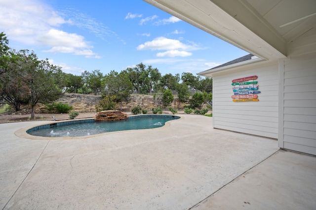 view of pool with a patio