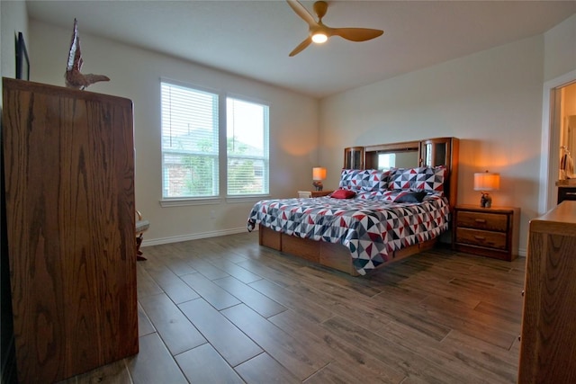 bedroom featuring ceiling fan and hardwood / wood-style floors