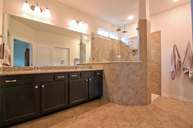 bathroom with vanity and walk in shower