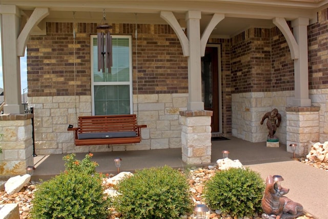 doorway to property with covered porch