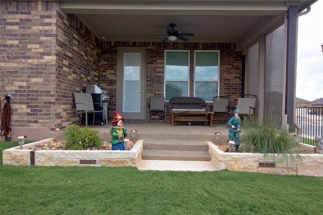 view of patio with a grill and ceiling fan