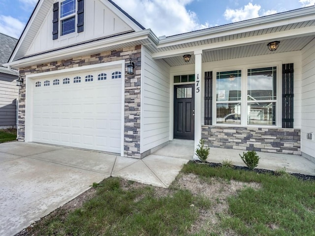 view of front facade with a porch and a garage