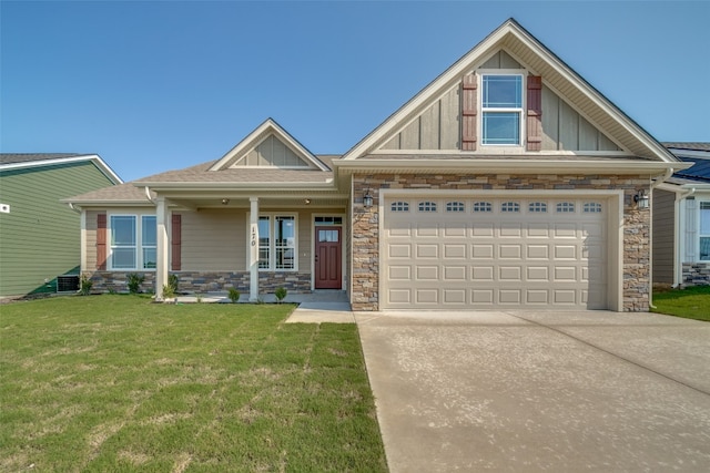 craftsman-style home with central air condition unit, a front yard, and a porch