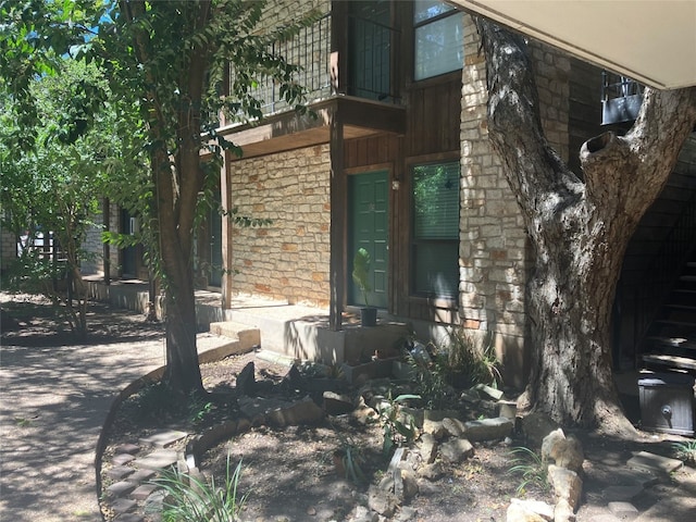 view of home's exterior featuring stone siding