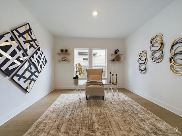 sitting room with light hardwood / wood-style flooring