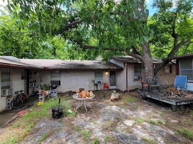 view of front of house featuring cooling unit