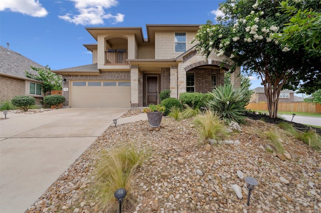 view of front of property with a garage