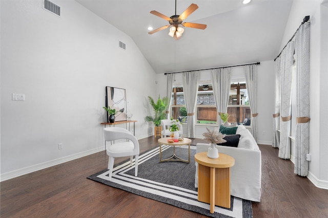 living room with dark hardwood / wood-style floors, ceiling fan, and lofted ceiling