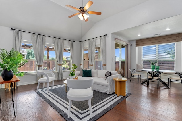 sunroom with ceiling fan and lofted ceiling