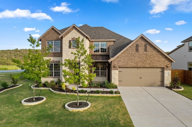 craftsman-style house with a garage and a front yard