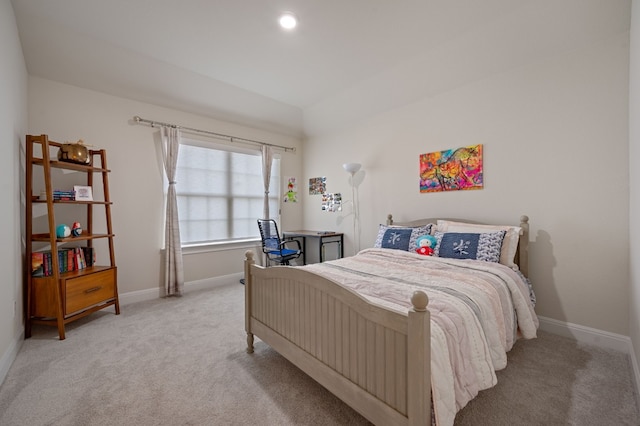 bedroom with light carpet