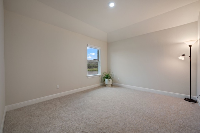 unfurnished room with carpet flooring