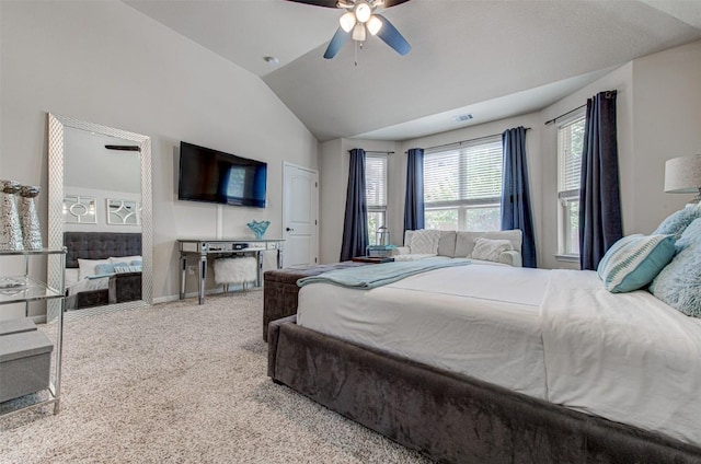 bedroom featuring carpet, vaulted ceiling, and ceiling fan