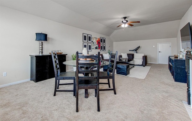 3113 Pasqueflower Pass, Pflugerville, TX 78660 - dining room with light carpet, a ceiling fan, lofted ceiling, and baseboards