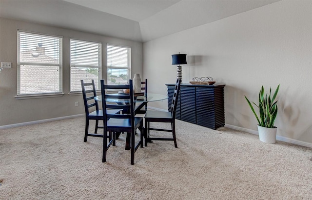 3113 Pasqueflower Pass, Pflugerville, TX 78660 - carpeted dining room featuring vaulted ceiling and baseboards