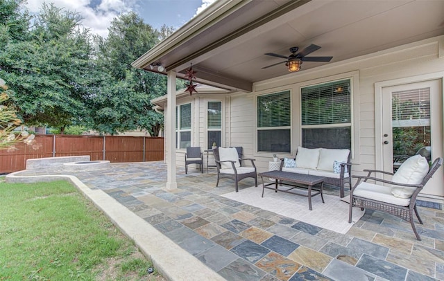 view of patio / terrace with ceiling fan and an outdoor hangout area