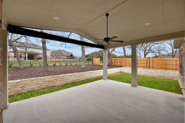 view of patio featuring ceiling fan