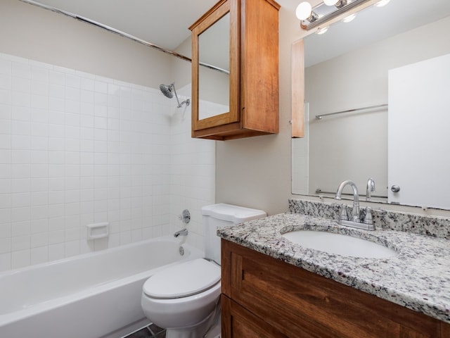 full bathroom with vanity, shower / bathtub combination, and toilet