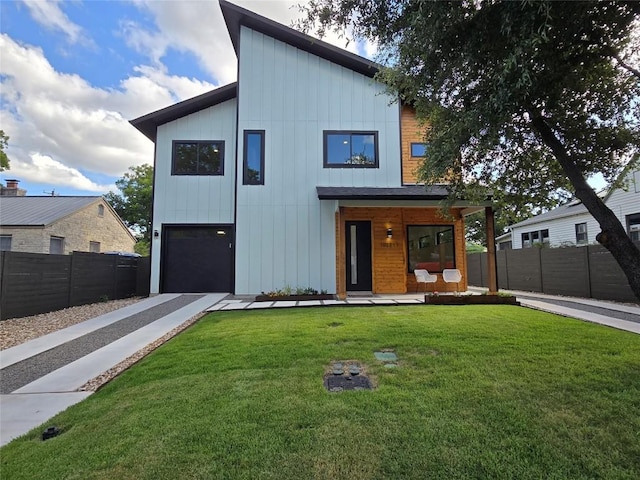 contemporary home with a front lawn