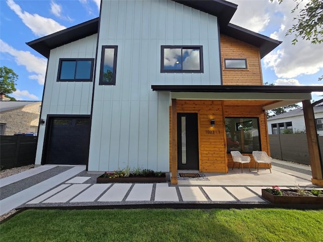 back of house with a patio area