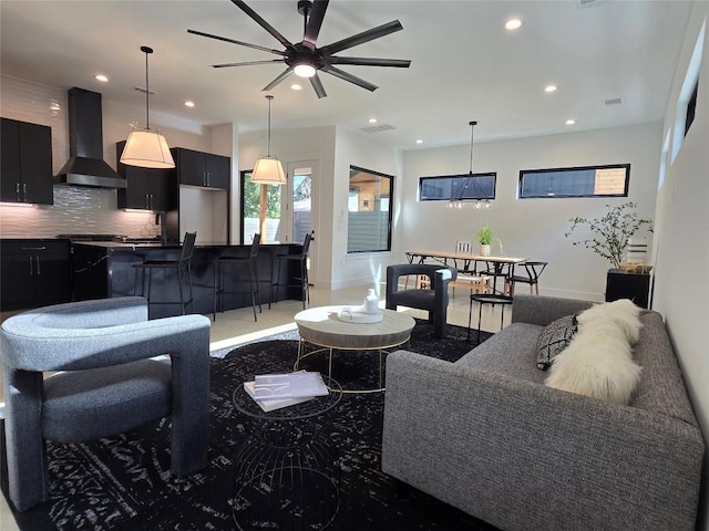 living room featuring ceiling fan