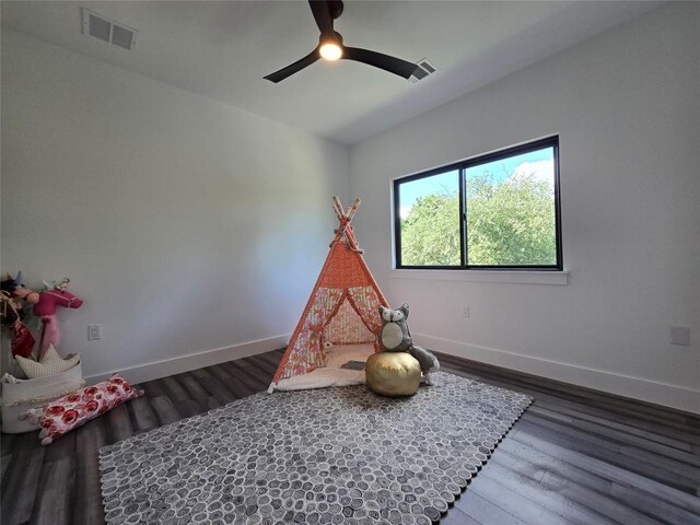 rec room featuring wood-type flooring and ceiling fan