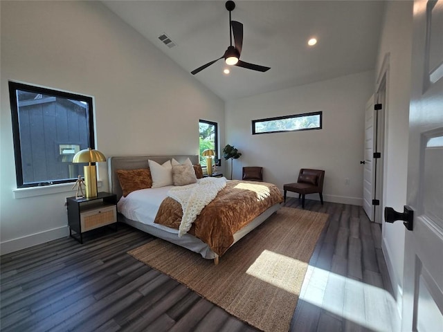 bedroom featuring high vaulted ceiling, dark wood-type flooring, and ceiling fan