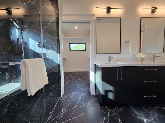 bathroom with a shower with shower door, tile flooring, and vanity