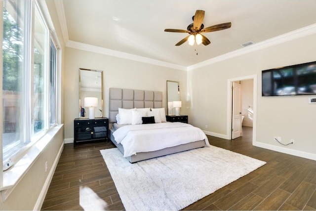 bedroom featuring multiple windows, connected bathroom, ceiling fan, and crown molding