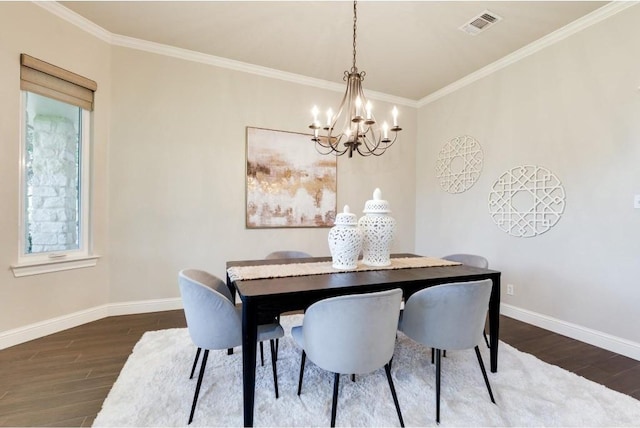 dining area with a chandelier, ornamental molding, a wealth of natural light, and dark wood-type flooring