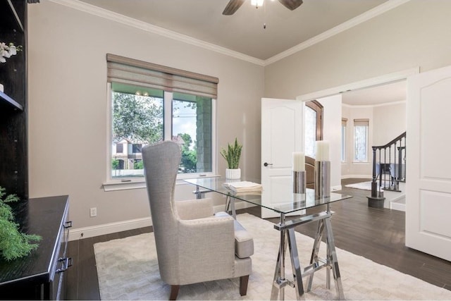 dining room with dark hardwood / wood-style flooring, crown molding, and a healthy amount of sunlight