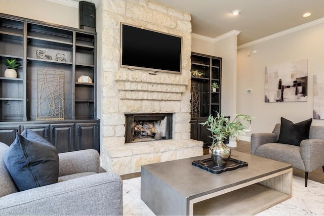 living room with crown molding and a fireplace