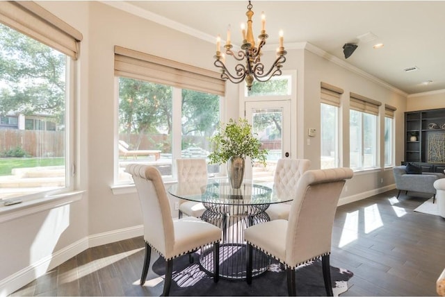 dining space featuring a chandelier, dark hardwood / wood-style floors, and ornamental molding