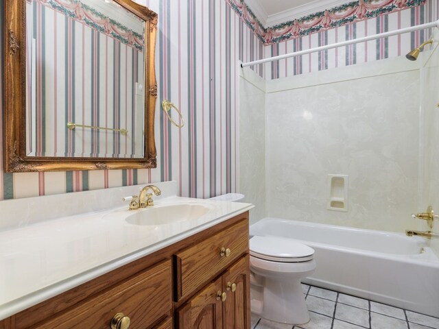 full bathroom with vanity with extensive cabinet space, toilet, tile floors, ornamental molding, and shower / bathing tub combination