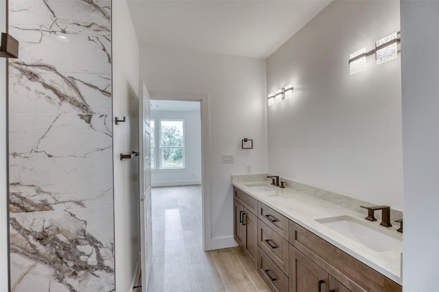 bathroom featuring hardwood / wood-style floors and vanity