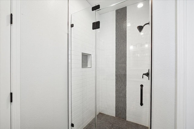 bathroom with an enclosed shower