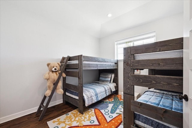 bedroom featuring dark hardwood / wood-style flooring