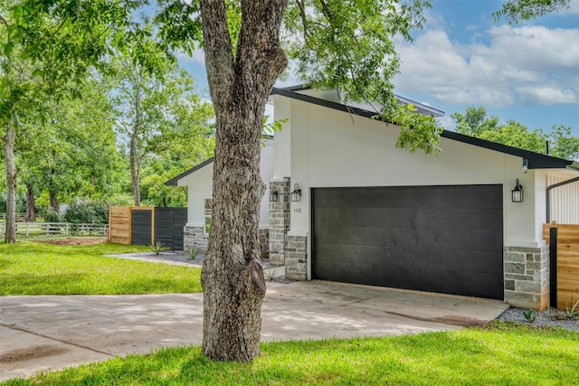 view of property exterior featuring a lawn