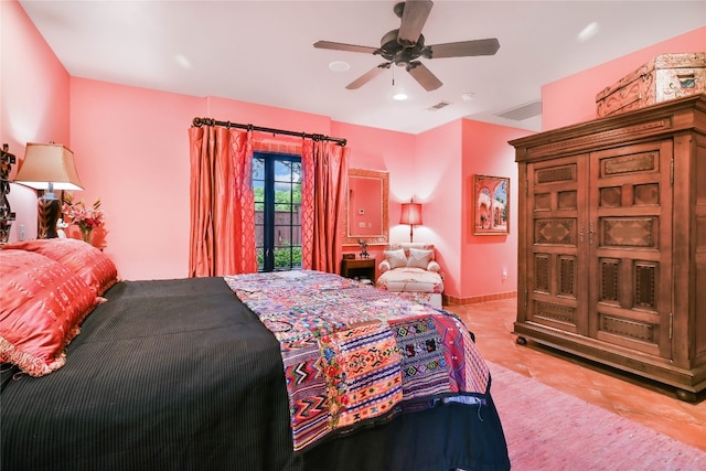 tiled bedroom with ceiling fan and access to exterior