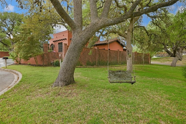 view of yard featuring fence