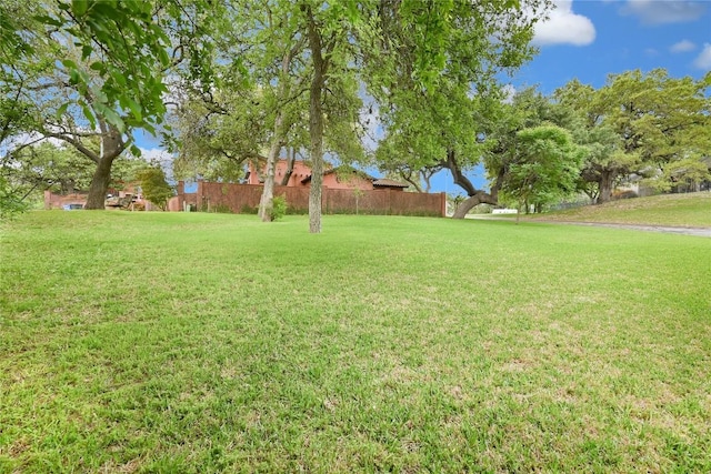 view of yard featuring fence