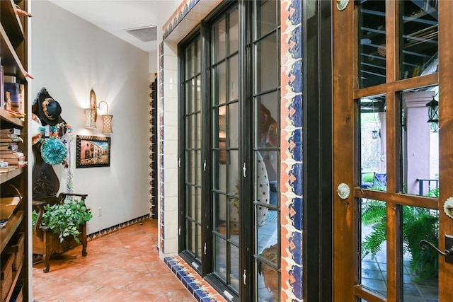 doorway to outside with visible vents