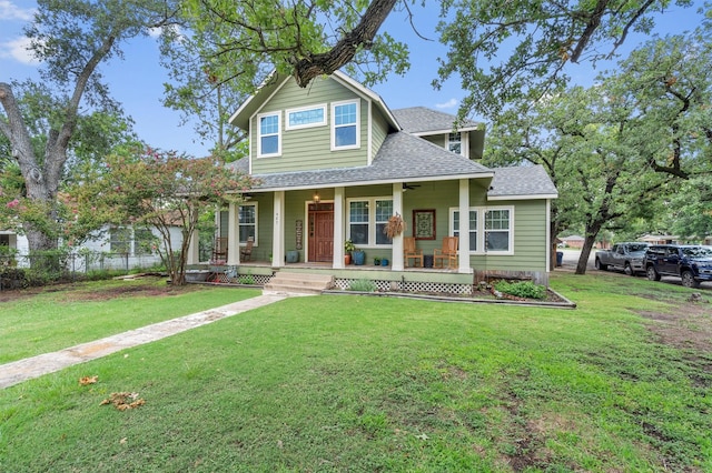 view of front of property with a porch and a front yard