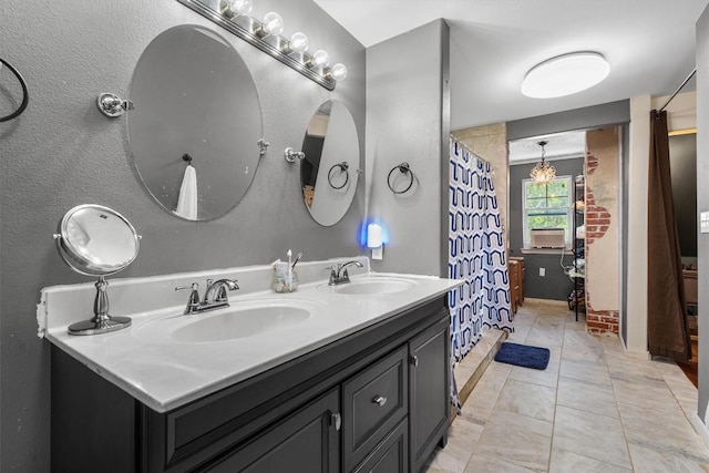 bathroom with vanity and tile patterned floors