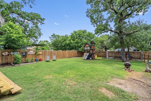 view of yard with a playground