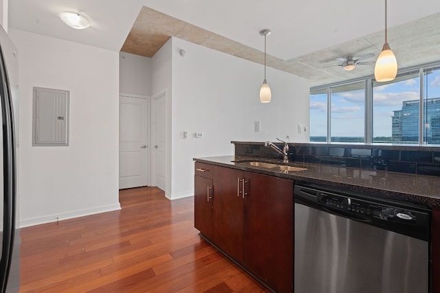 kitchen featuring electric panel, decorative light fixtures, stainless steel dishwasher, and ceiling fan