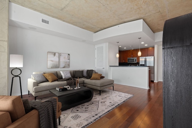 living room with dark wood-type flooring