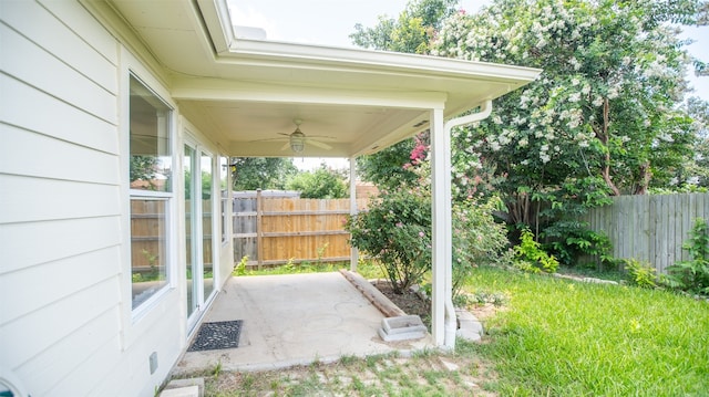 view of patio featuring ceiling fan